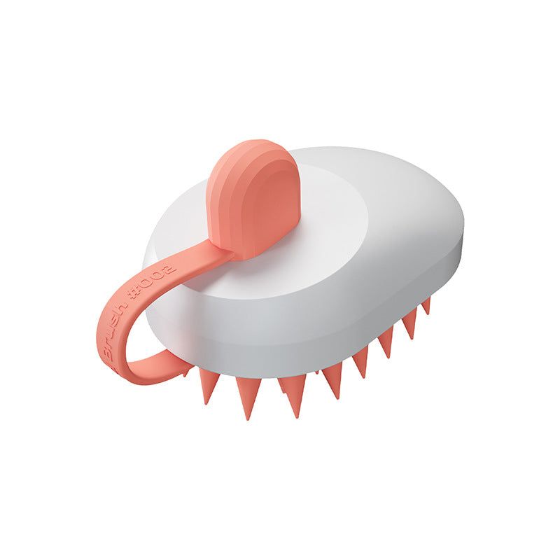 White and pink pet grooming brush with a handle on a white background