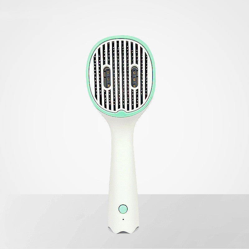 Handheld hair dryer with green accents on a white background