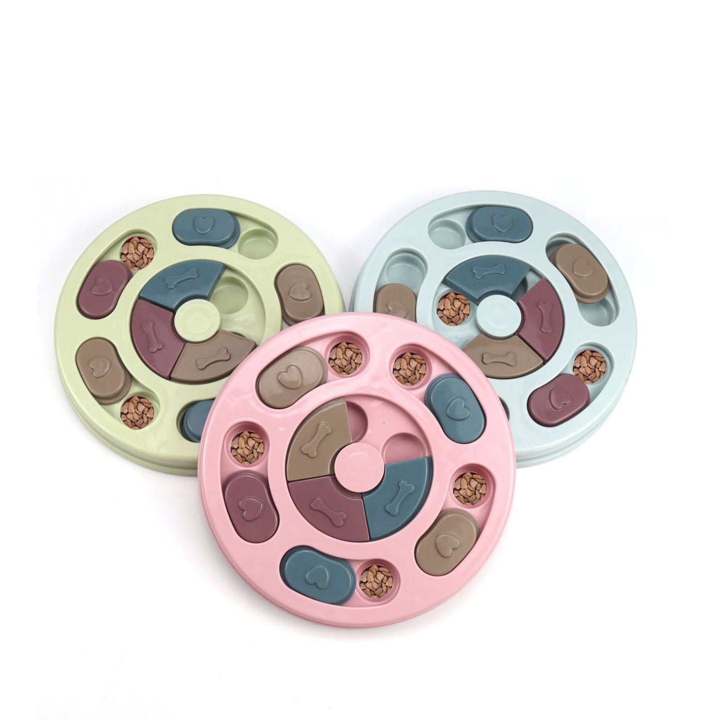 Three circular pet toys with paw prints and heart shapes on a white background
