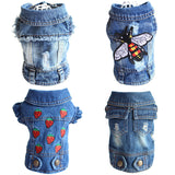 Denim dog coat with bee and strawberry designs on a white background