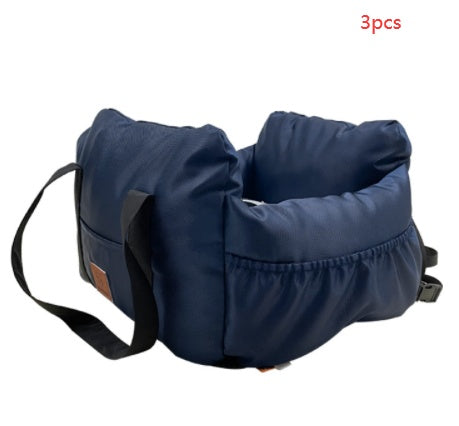 Blue pet carrier with straps on a white background