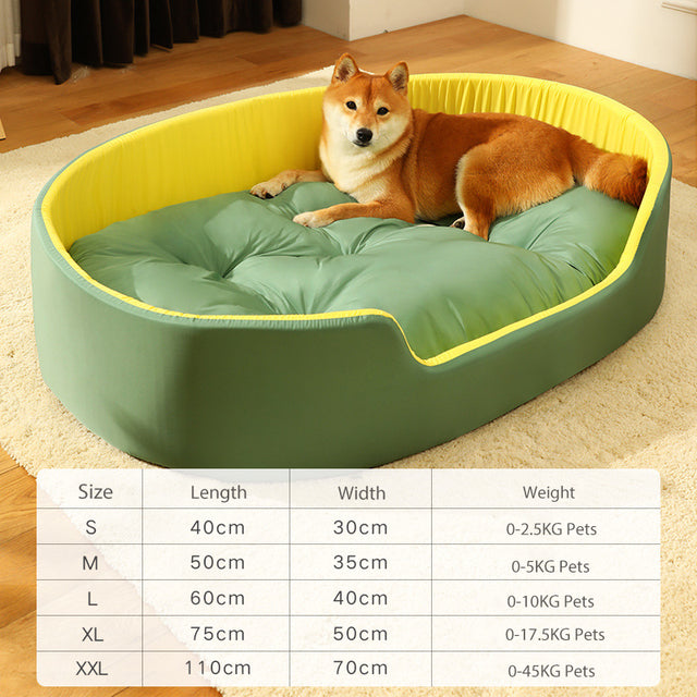 Dog lying on a green and yellow pet bed with size chart below