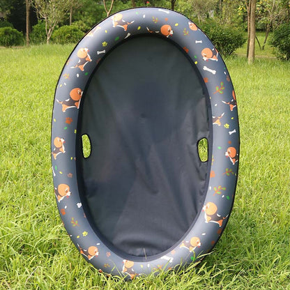 Inflatable pet seat with cartoon designs on a grassy field