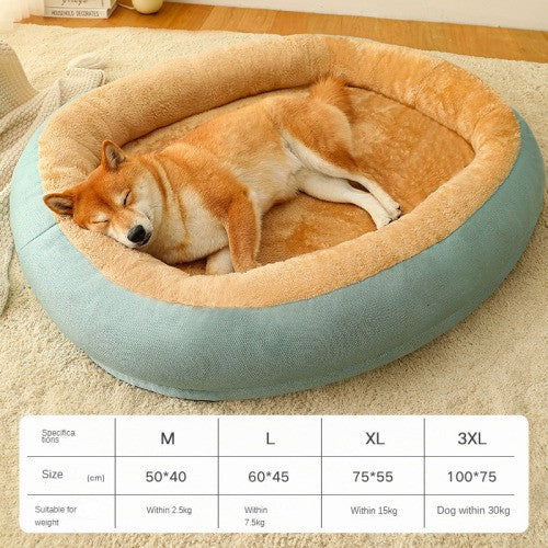 Dog sleeping in a round pet bed with size chart on a carpeted floor.