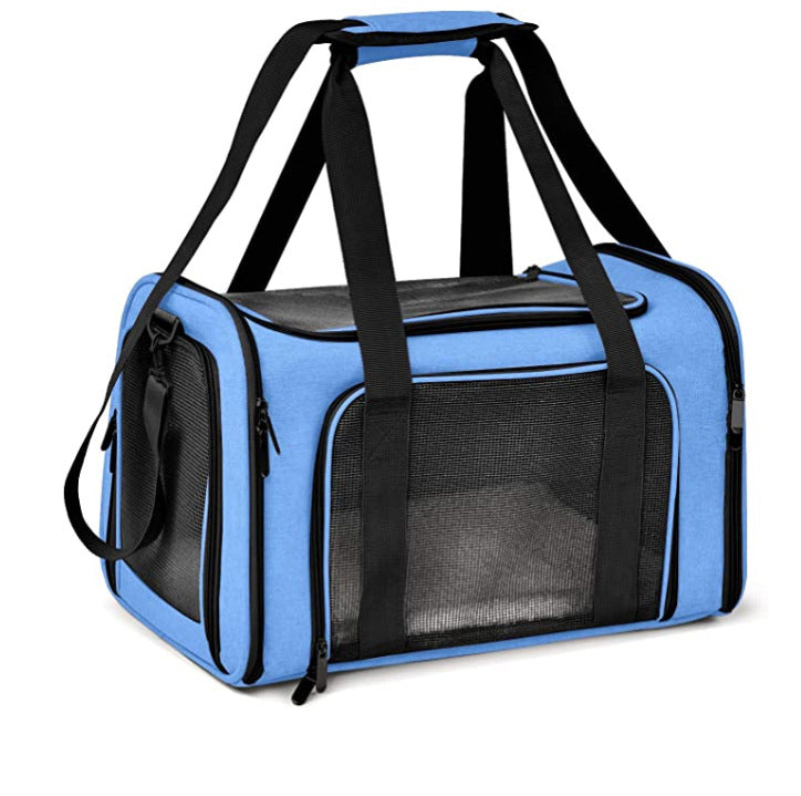 Blue pet carrier with black straps on a white background