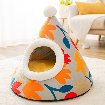Colorful pet bed with floral patterns on a light background
