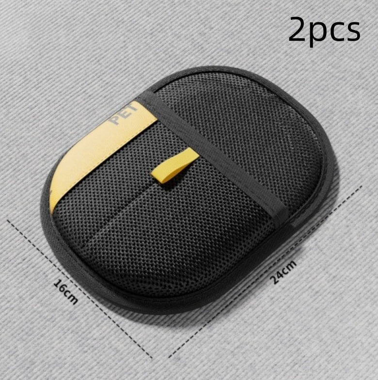 Black mesh car seat cover with gold accents on a gray background