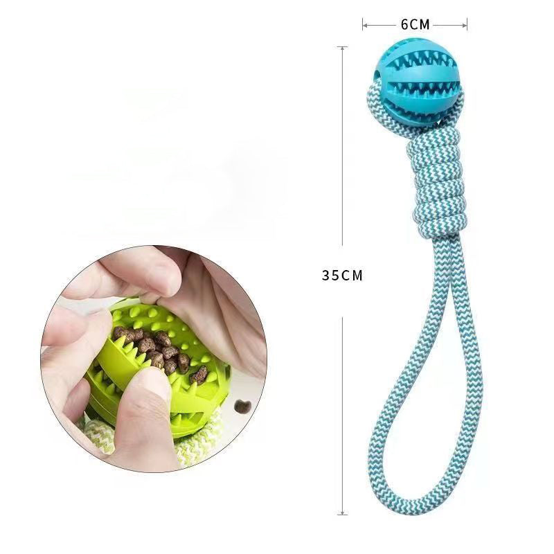 Dog toy with blue ball and green base, featuring measurements and a close-up of a hand interacting with the toy.