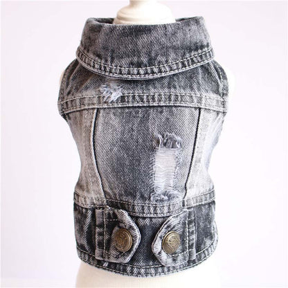 Denim vest with distressed details on a white background