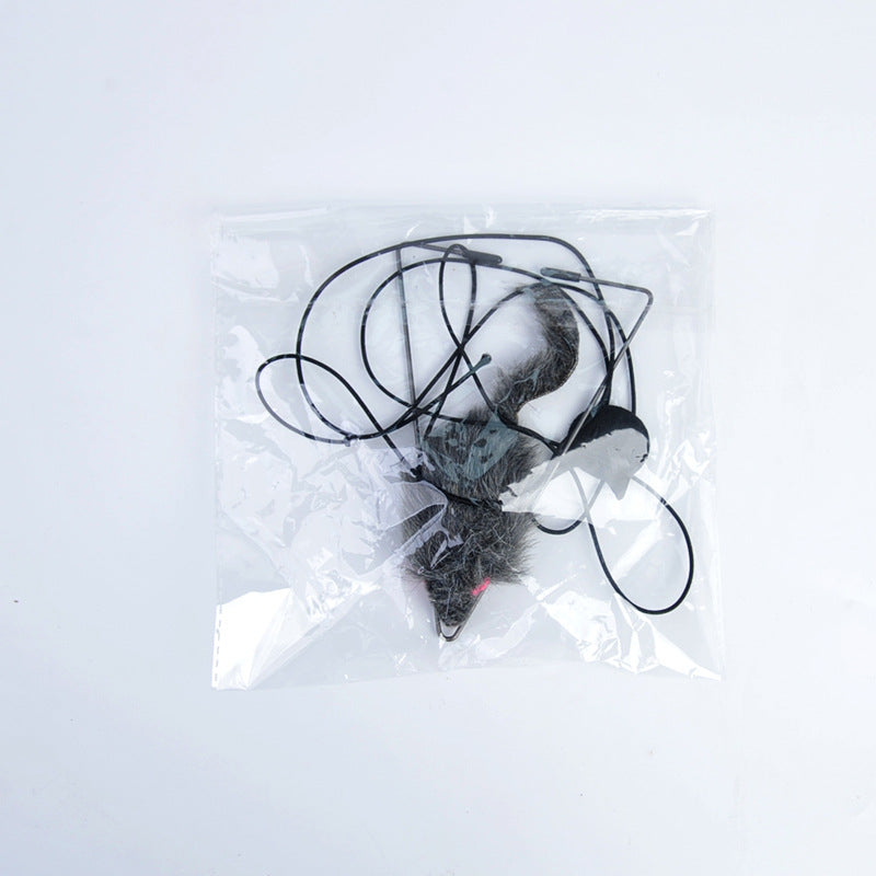 Mouse trap in a clear plastic bag on a white background