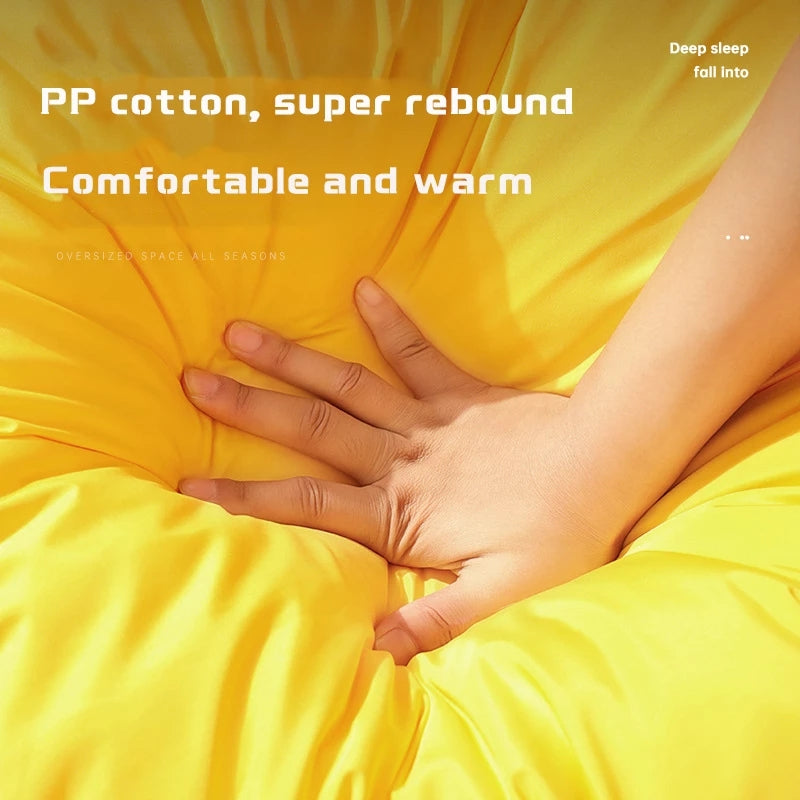 Hand resting on a yellow fabric with text about PP cotton and comfort.