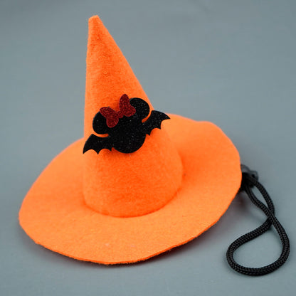 Orange witch hat with black bat and bow design on a gray background